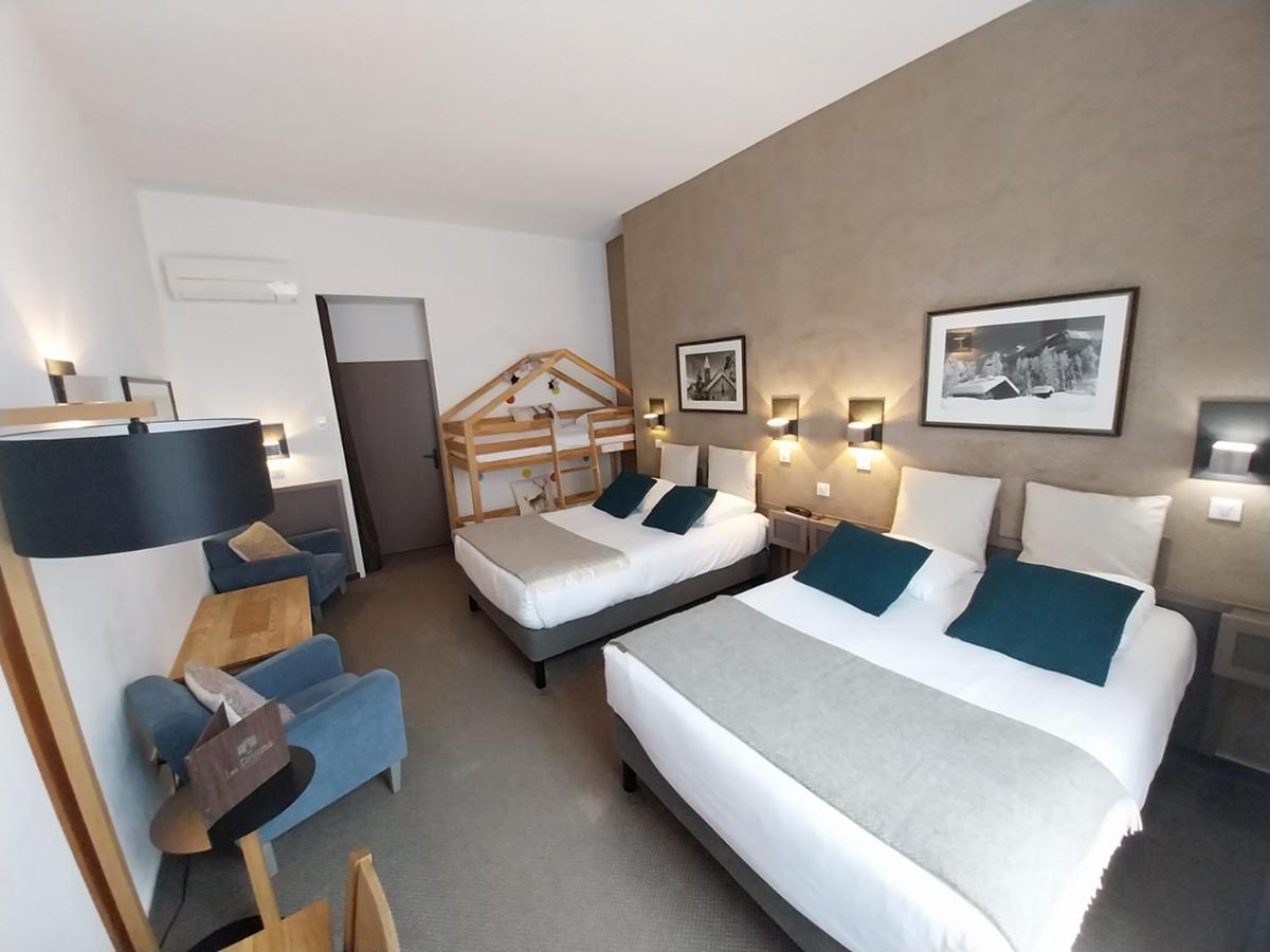 Un ou plusieurs lits dans un hébergement de l'établissement Hôtel des Princes, Chambéry Centre