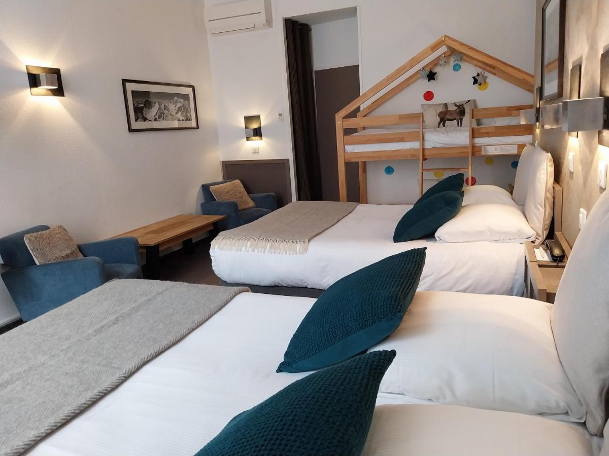 Un ou plusieurs lits dans un hébergement de l'établissement Hôtel des Princes, Chambéry Centre
