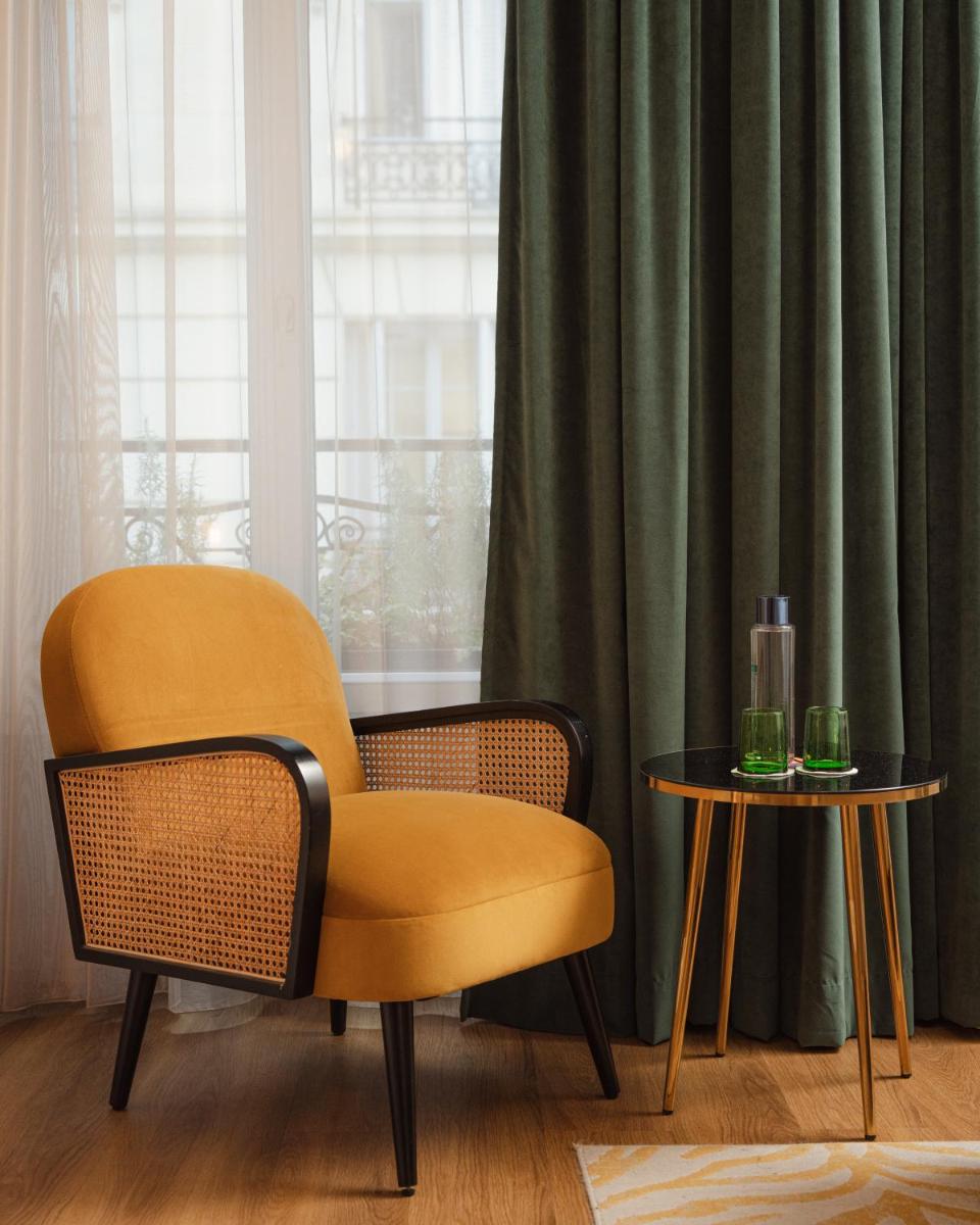Coin salon dans l'établissement Hôtel Artemisia Montmartre