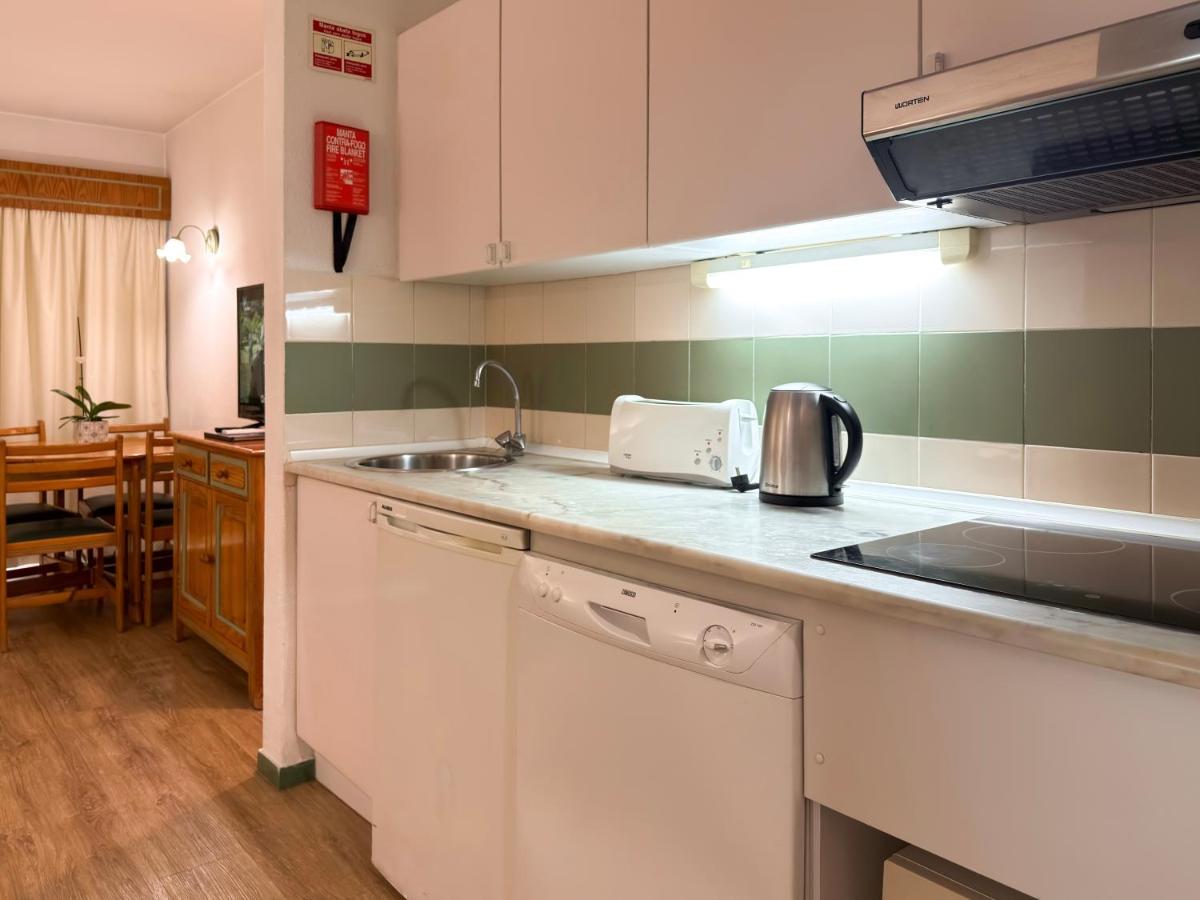 A cozinha ou kitchenette de Luna Hotel da Oura