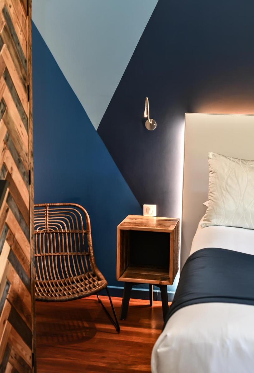 Un ou plusieurs lits dans un hébergement de l'établissement Les Frères Ibarboure - Hôtel 4 étoiles, Spa extérieur sensoriel et Restaurant étoilé à Bidart