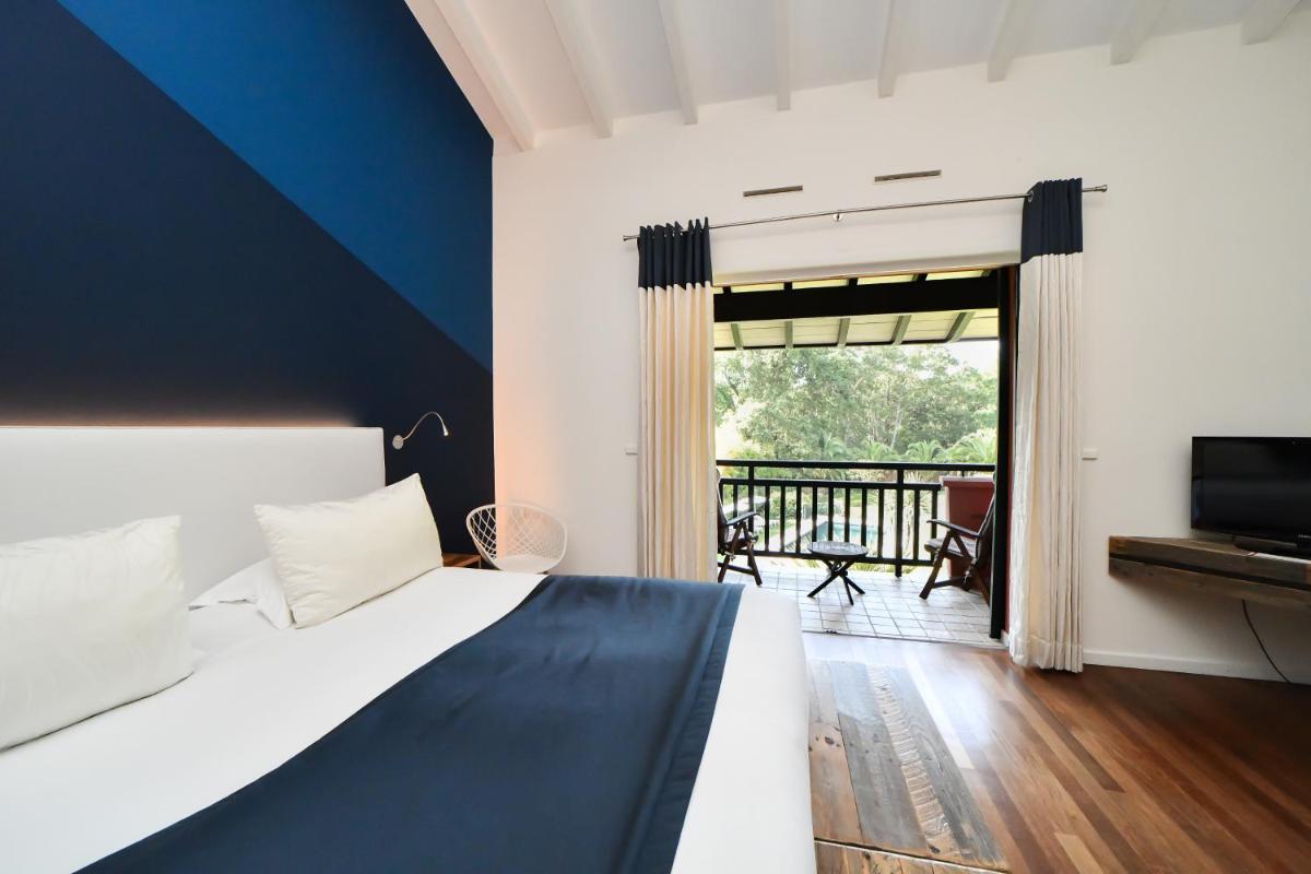 Un ou plusieurs lits dans un hébergement de l'établissement Les Frères Ibarboure - Hôtel 4 étoiles, Spa extérieur sensoriel et Restaurant étoilé à Bidart
