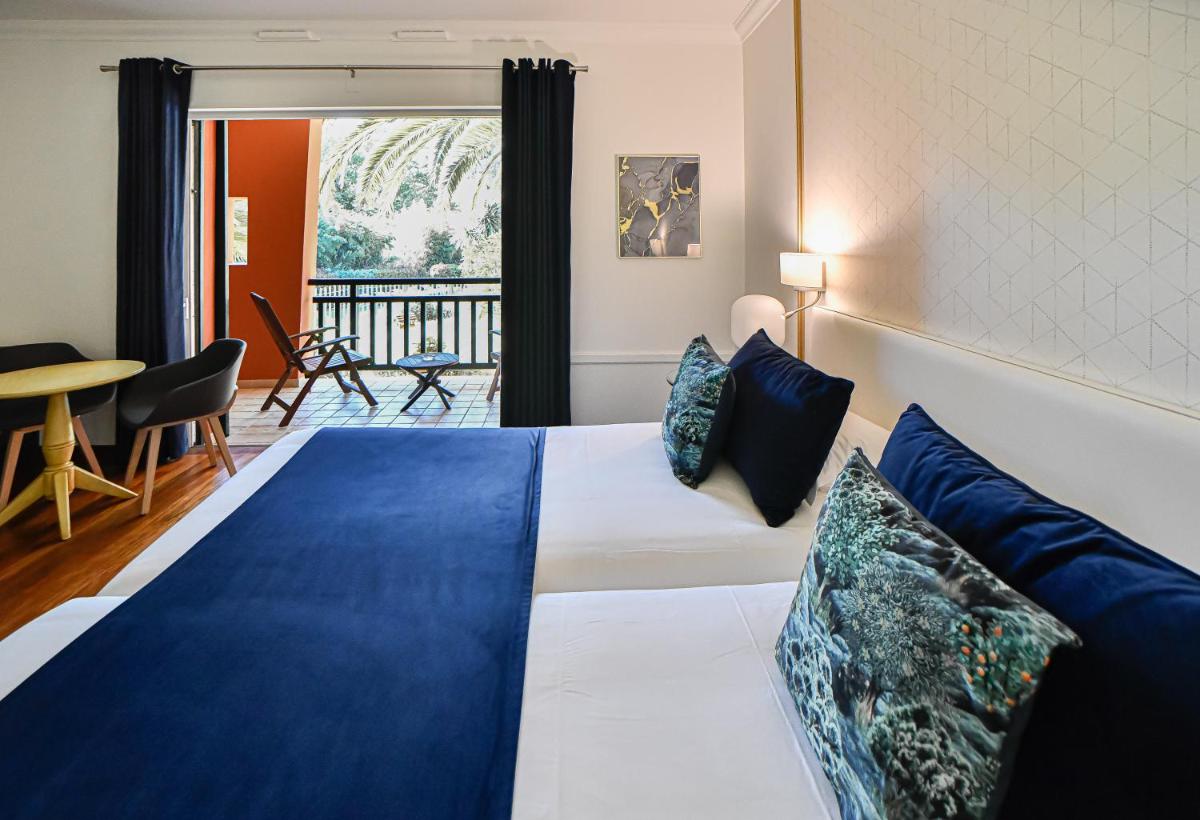 Un ou plusieurs lits dans un hébergement de l'établissement Les Frères Ibarboure - Hôtel 4 étoiles, Spa extérieur sensoriel et Restaurant étoilé à Bidart