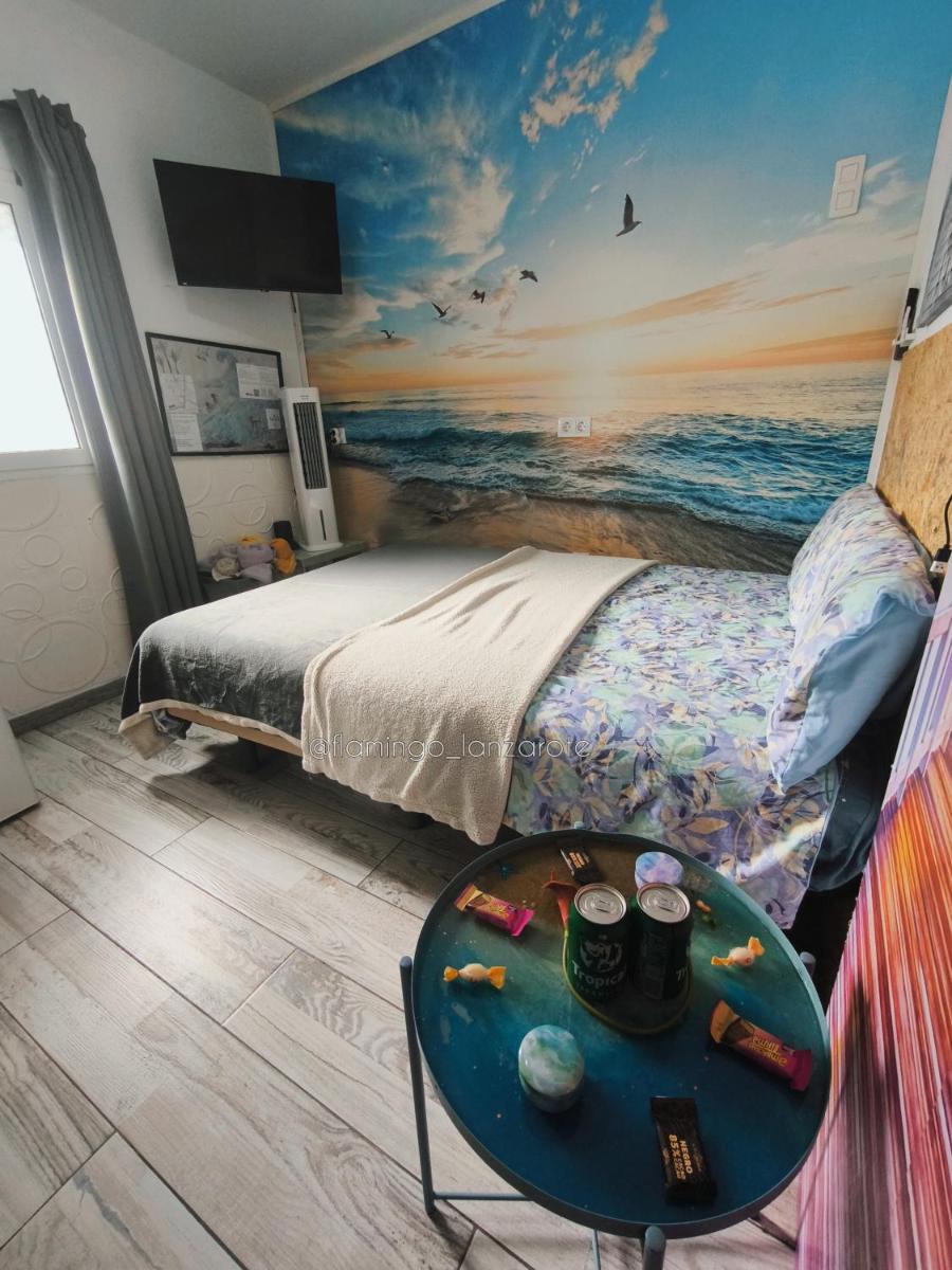 Habitacion Flamingo, entrada privada y baño privado en suite by flamingo house, no fumadores - Housity