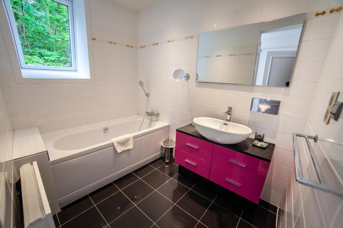 Salle de bains dans l'établissement Le Domaine de Beaulieu