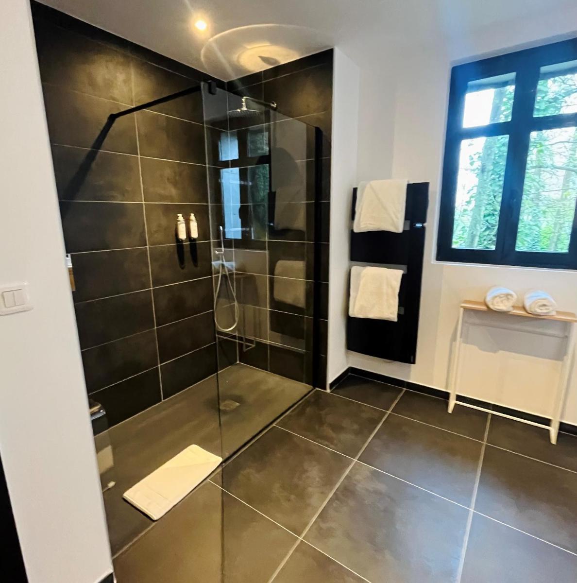 Salle de bains dans l'établissement Le Domaine de Beaulieu