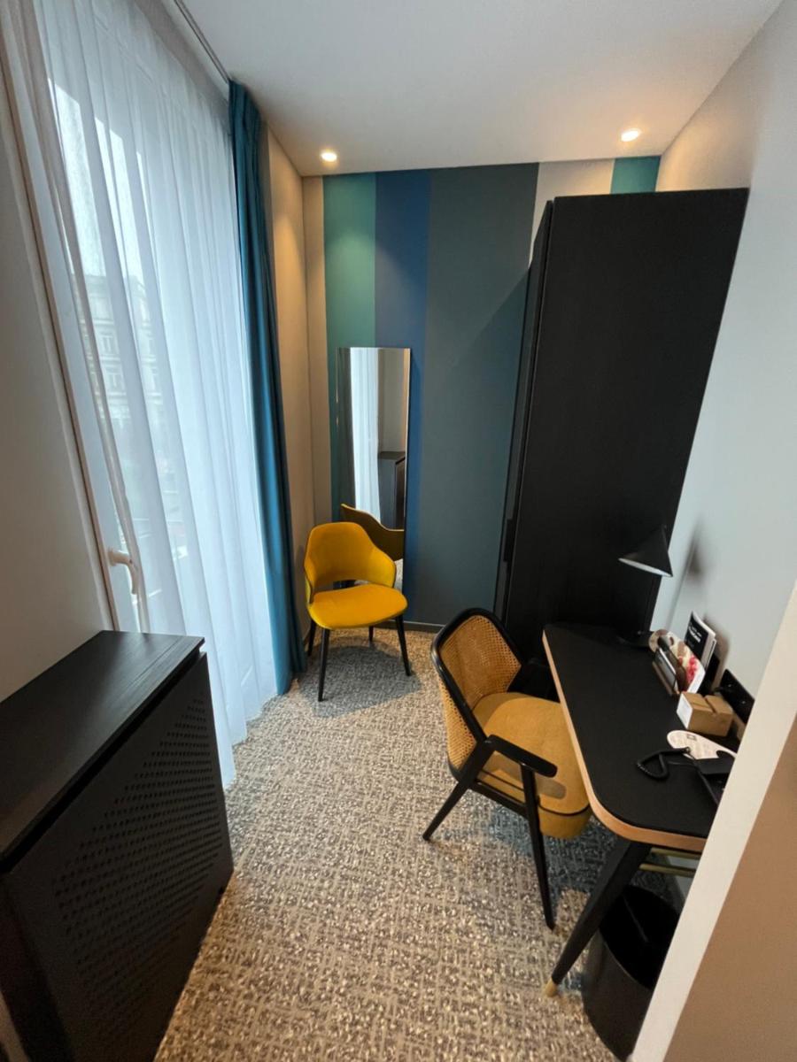 Télévision ou salle de divertissement dans l'établissement Mercure Epinal Centre