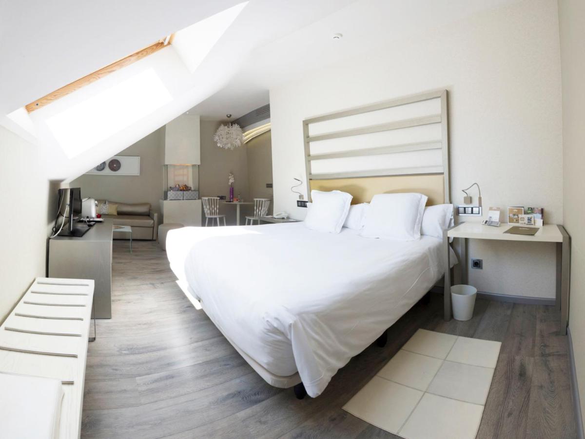 Cama o camas de una habitación en Hotel & Spa Princesa Munia