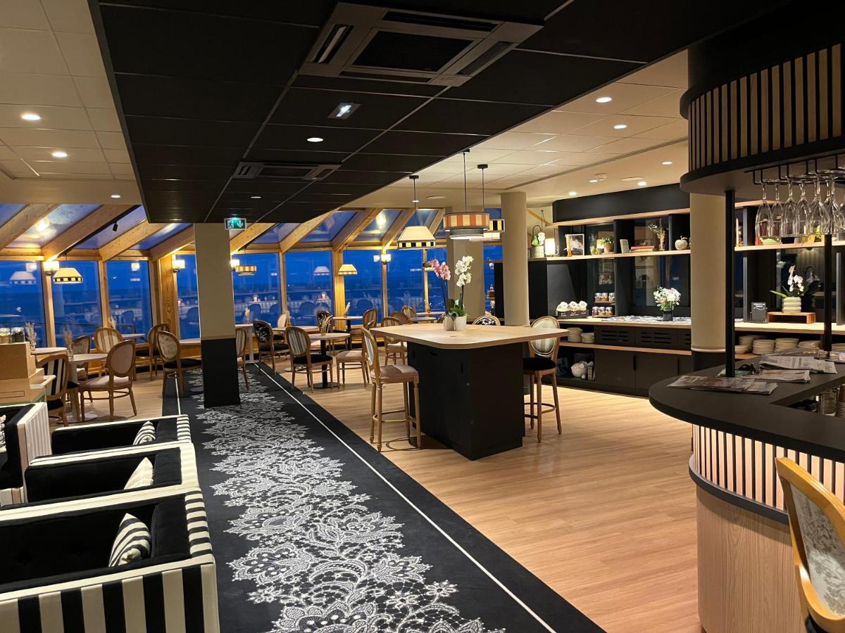 Restaurant ou autre lieu de restauration dans l'établissement Mercure Granville Le Grand Large