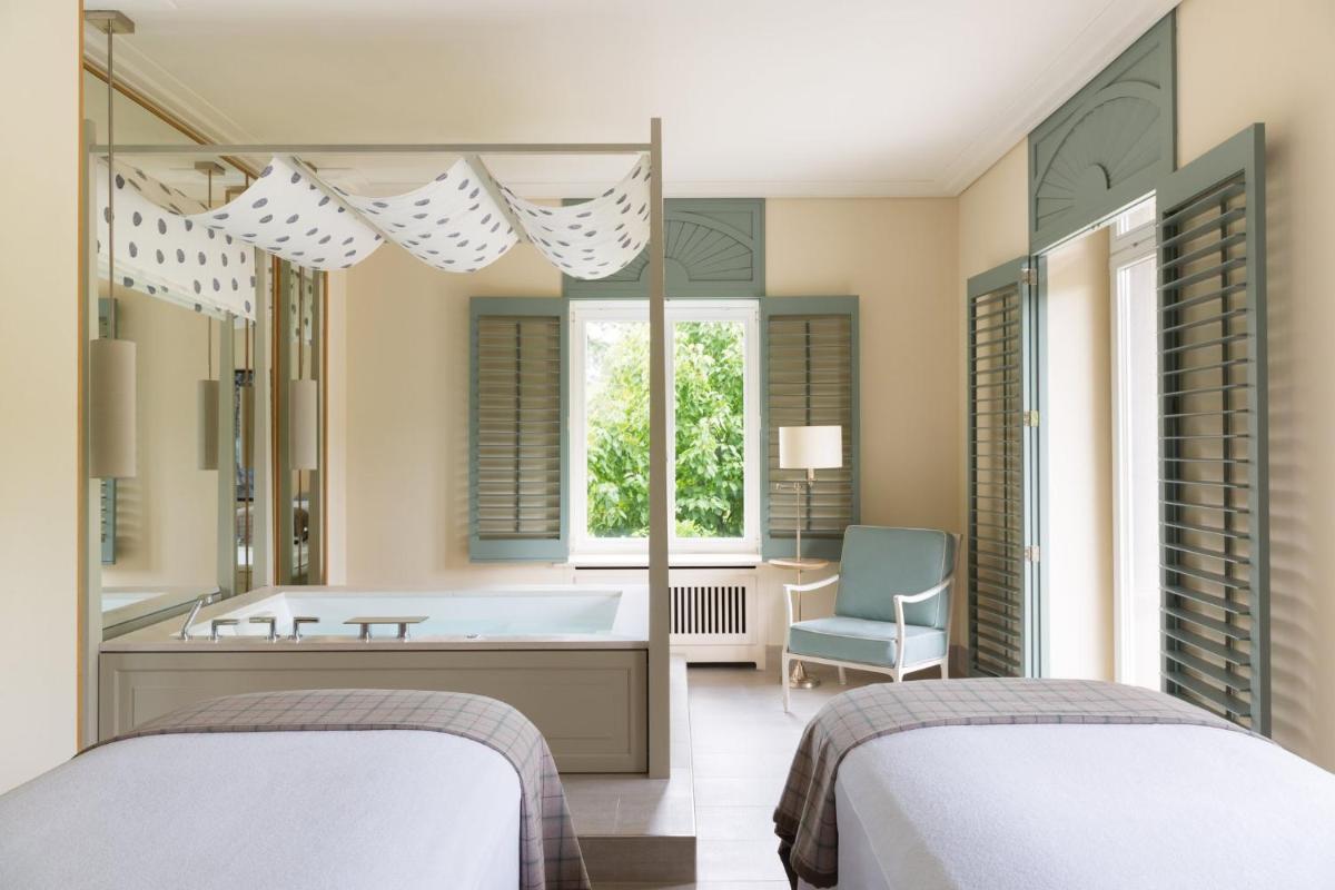 Ein Bett oder Betten in einem Zimmer der Unterkunft Brenners Park Hotel & Spa, Oetker Hotels