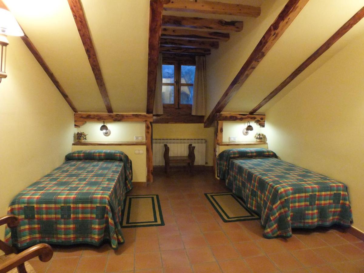 Cama o camas de una habitación en Hotel Rural & SPA Puente del Duratón