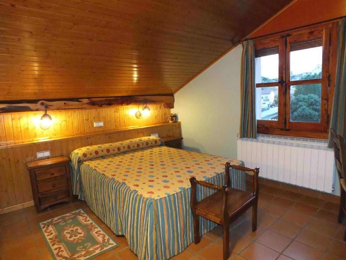 Cama o camas de una habitación en Hotel Rural & SPA Puente del Duratón