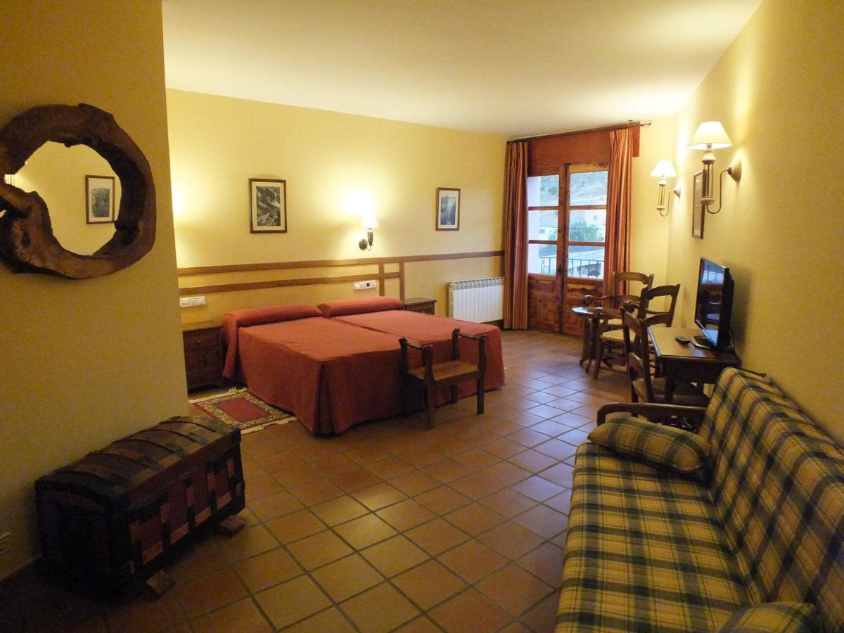 Cama o camas de una habitación en Hotel Rural & SPA Puente del Duratón