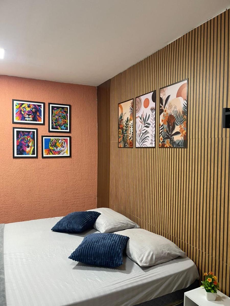 BERTIOGA suítes na praia centro - Housity