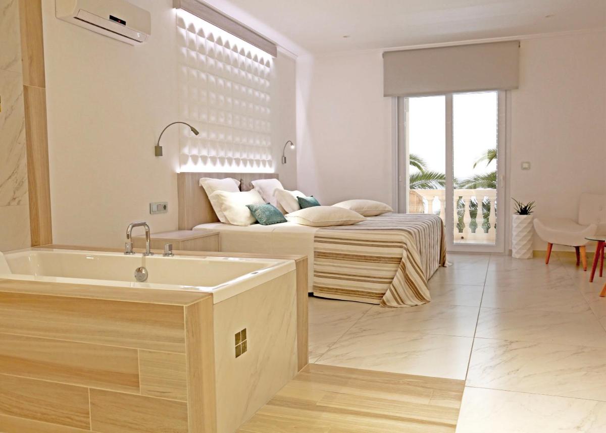 Cama o camas de una habitación en Hotel Vistabella