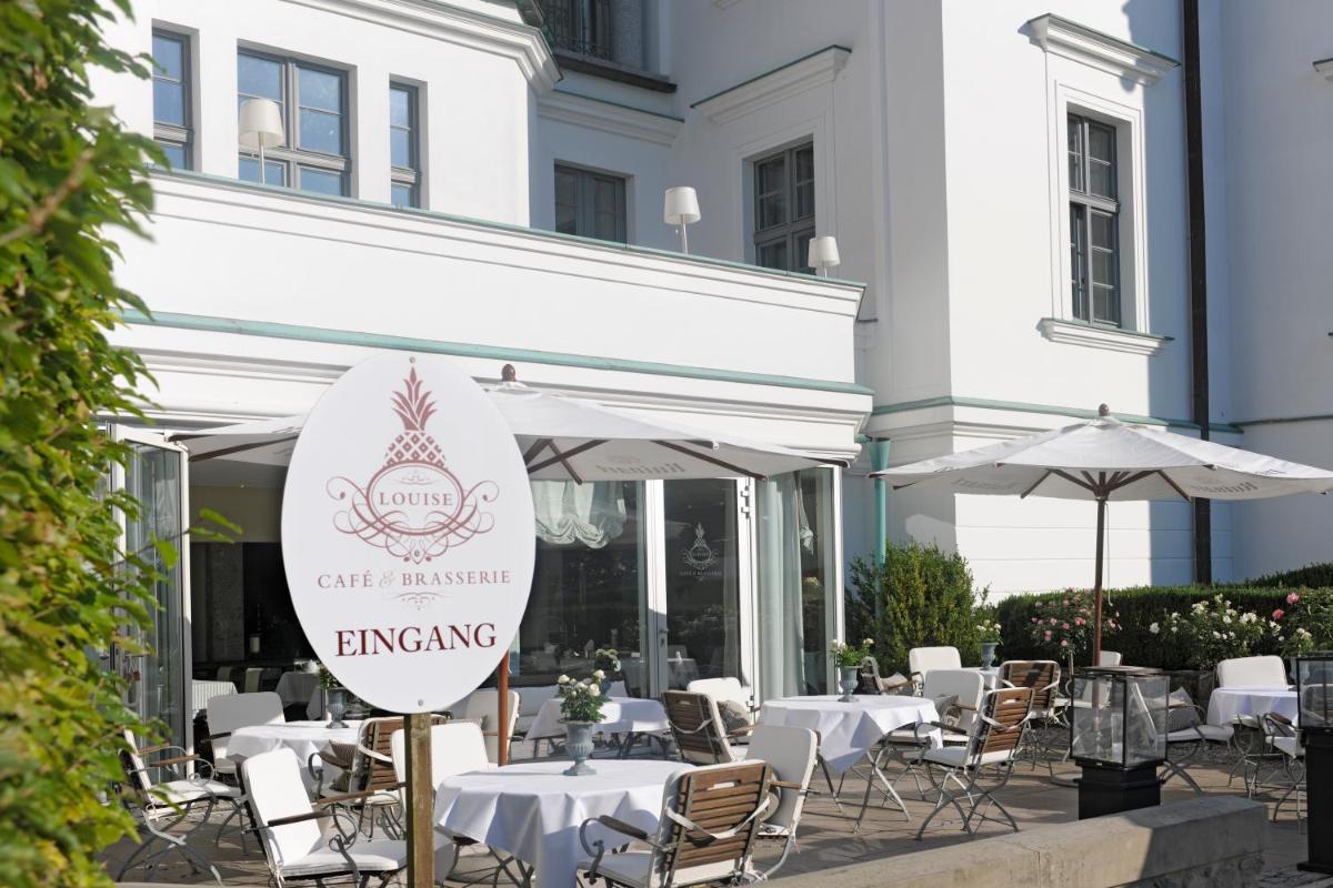 Ein Restaurant oder anderes Speiselokal in der Unterkunft Schlosshotel Burg Schlitz