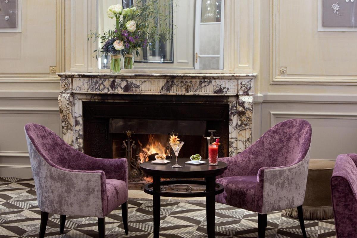 Coin salon dans l'établissement Waldorf Astoria Versailles - Trianon Palace