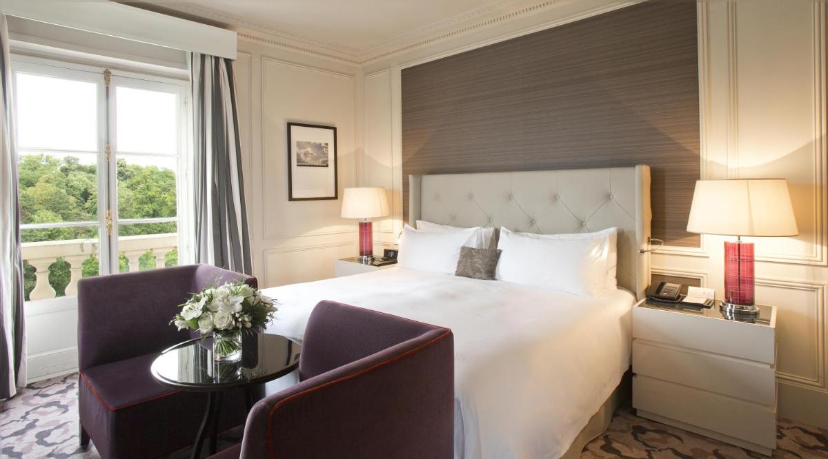 Un ou plusieurs lits dans un hébergement de l'établissement Waldorf Astoria Versailles - Trianon Palace