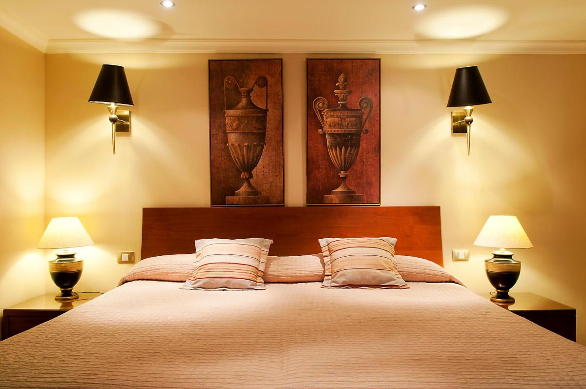 Cama o camas de una habitación en Laguna Nivaria Hotel & Spa