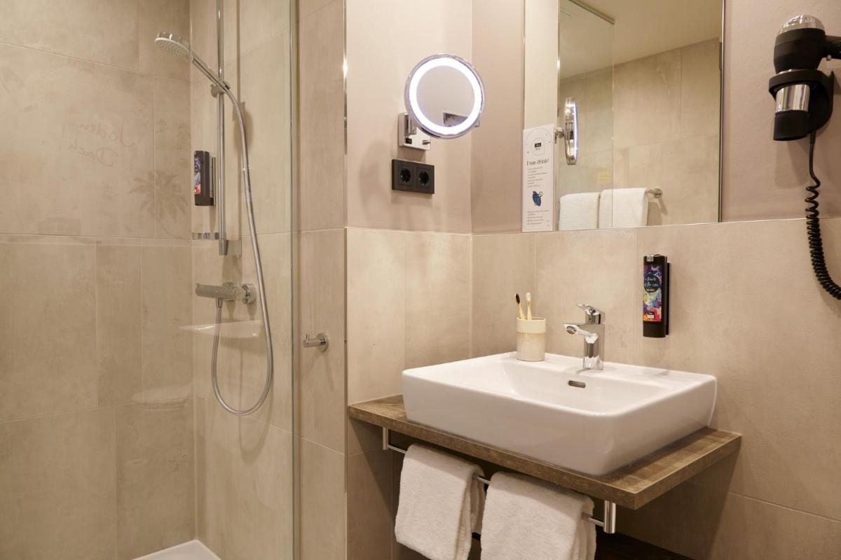 Holiday Inn - the niu, Hub Dusseldorf Messe by IHG - Housity
