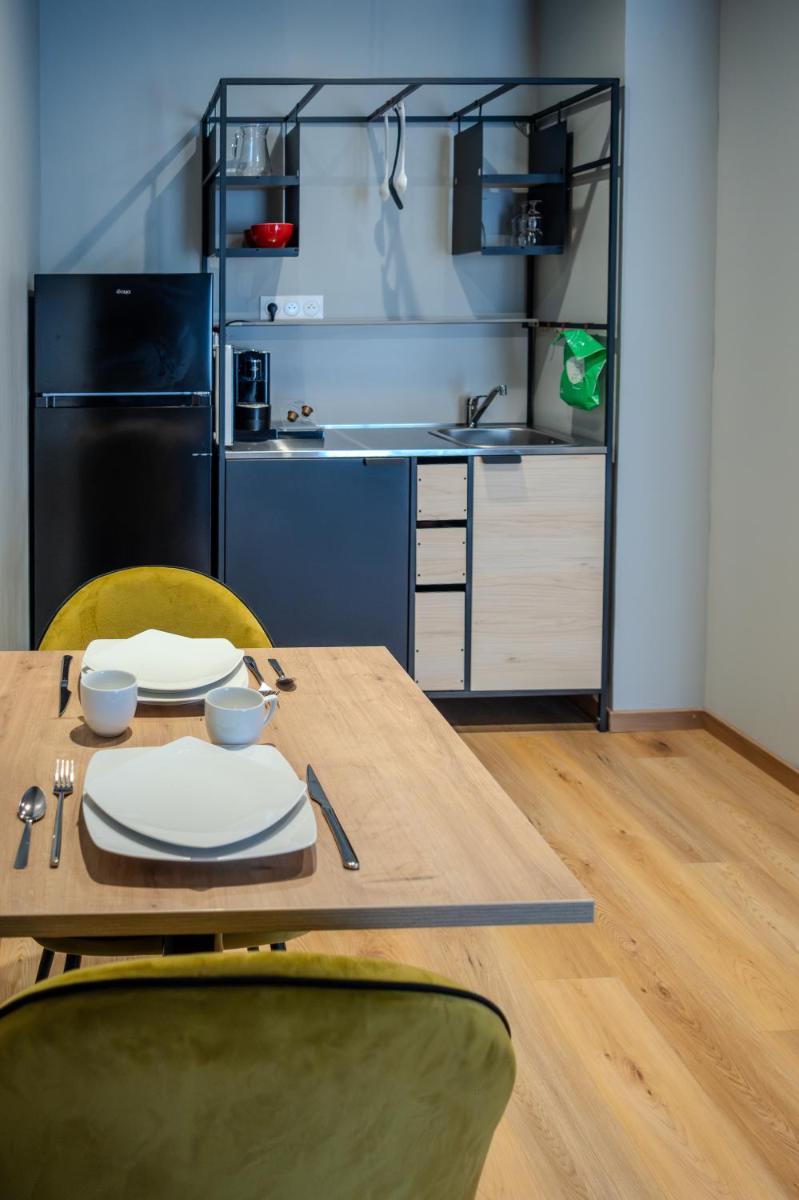 Cuisine ou kitchenette dans l'établissement Tulip Inn Honfleur Residence & Spa