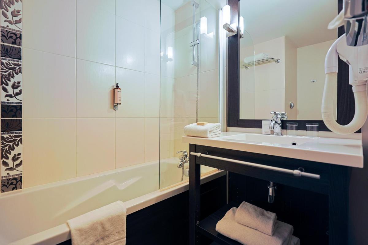 Salle de bains dans l'établissement Seven Urban Suites Nantes Centre