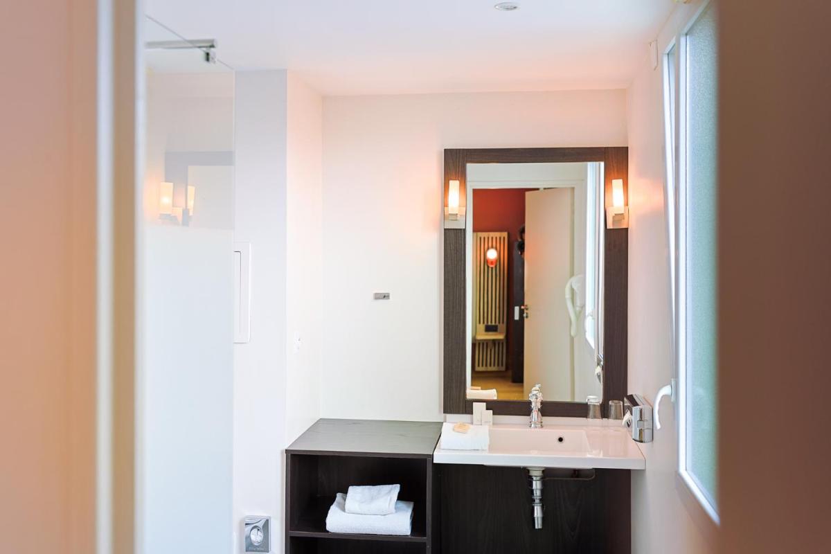 Salle de bains dans l'établissement Seven Urban Suites Nantes Centre