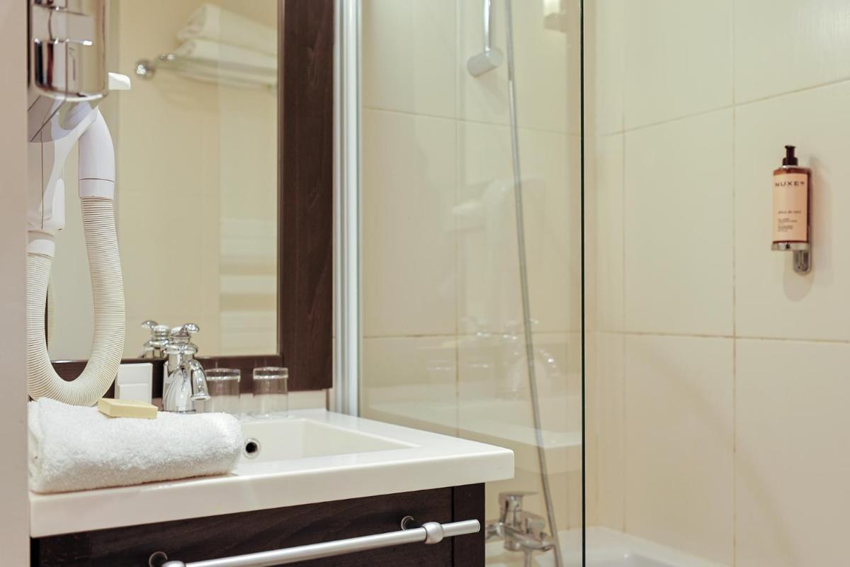 Salle de bains dans l'établissement Seven Urban Suites Nantes Centre