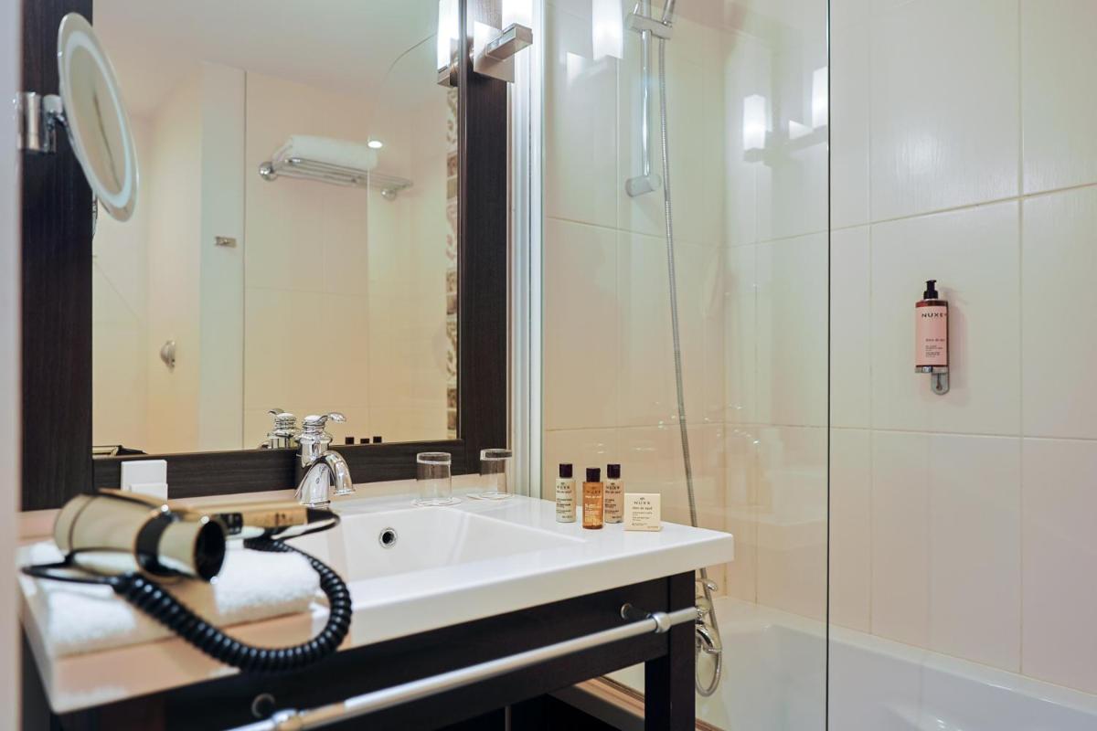 Salle de bains dans l'établissement Seven Urban Suites Nantes Centre