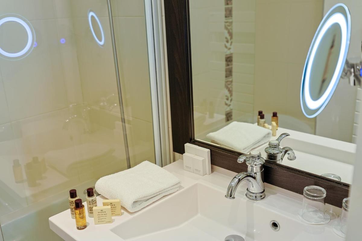 Salle de bains dans l'établissement Seven Urban Suites Nantes Centre