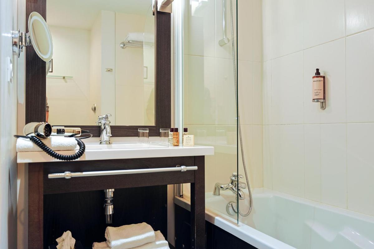 Salle de bains dans l'établissement Seven Urban Suites Nantes Centre