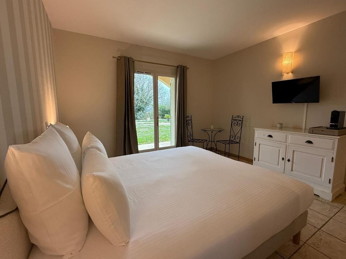Télévision ou salle de divertissement dans l'établissement CÉRÈS - Boutique-Hôtel & Spa