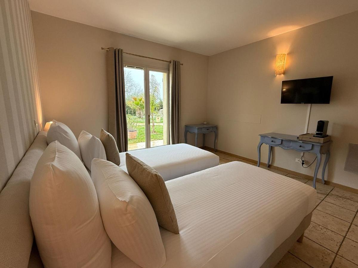 Télévision ou salle de divertissement dans l'établissement CÉRÈS - Boutique-Hôtel & Spa