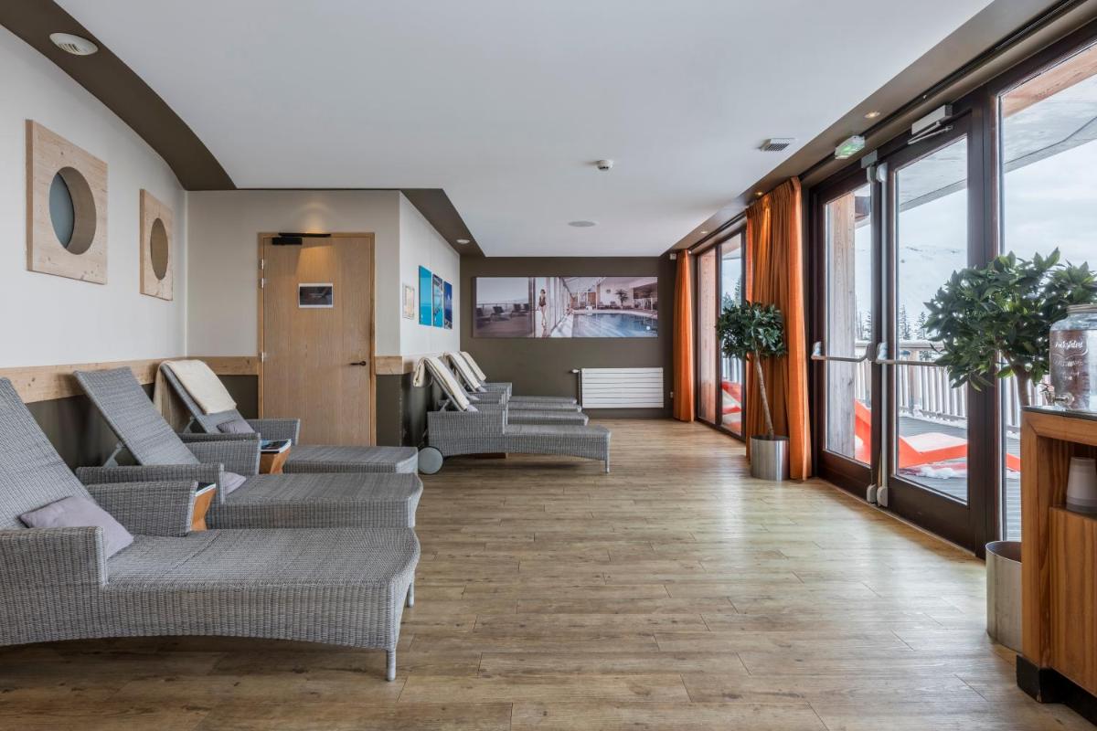 Coin salon dans l'établissement Résidence Pierre & Vacances Premium L'Amara