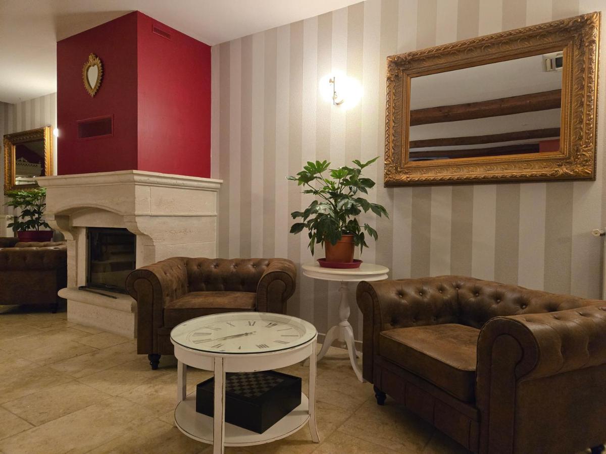 Coin salon dans l'établissement CÉRÈS - Boutique-Hôtel & Spa