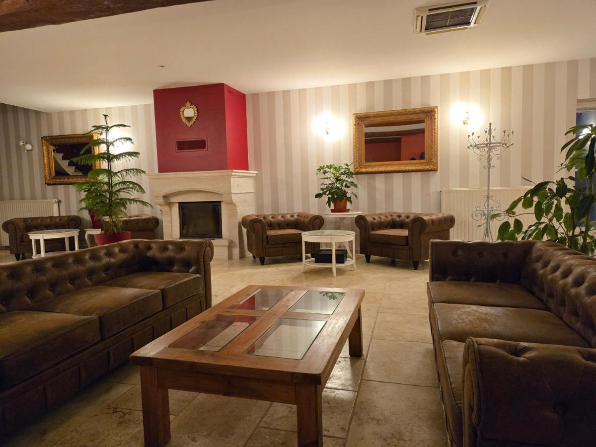 Coin salon dans l'établissement CÉRÈS - Boutique-Hôtel & Spa