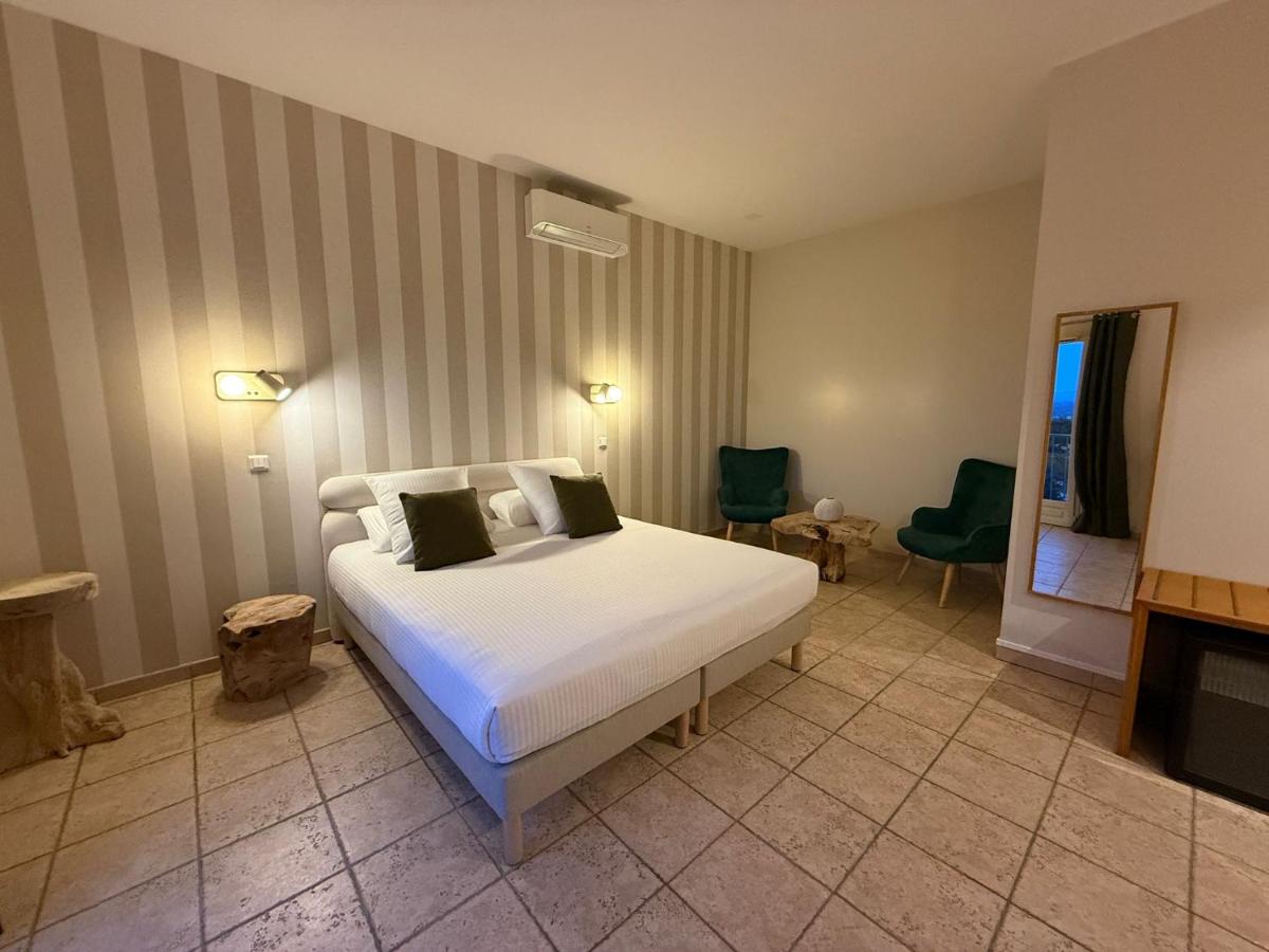 Un ou plusieurs lits dans un hébergement de l'établissement CÉRÈS - Boutique-Hôtel & Spa