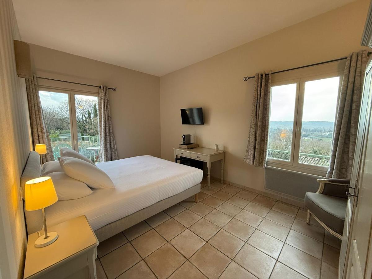 Un ou plusieurs lits dans un hébergement de l'établissement CÉRÈS - Boutique-Hôtel & Spa