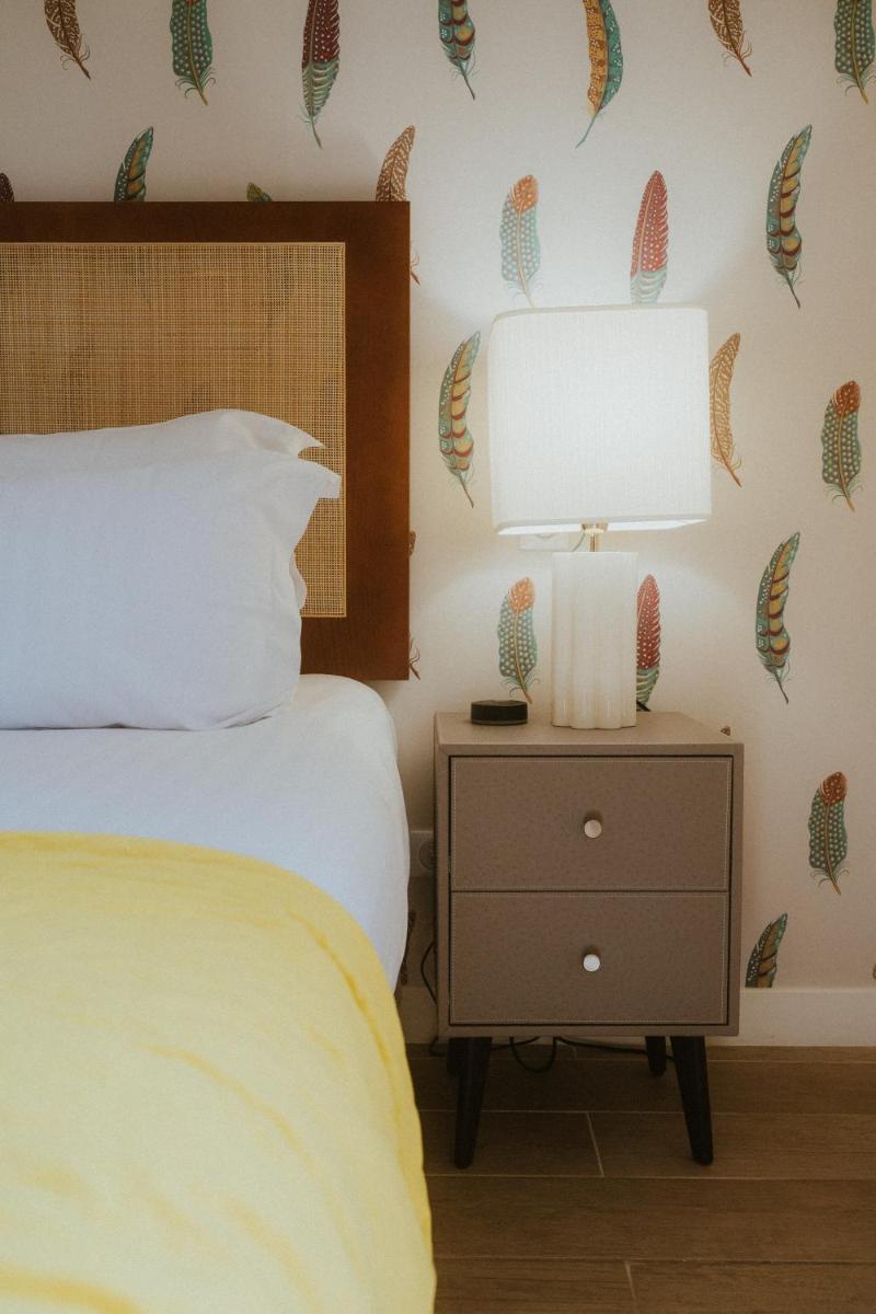 Un ou plusieurs lits dans un hébergement de l'établissement Domaine Du Roncemay - Hôtel, Restaurants, Spa & Golf