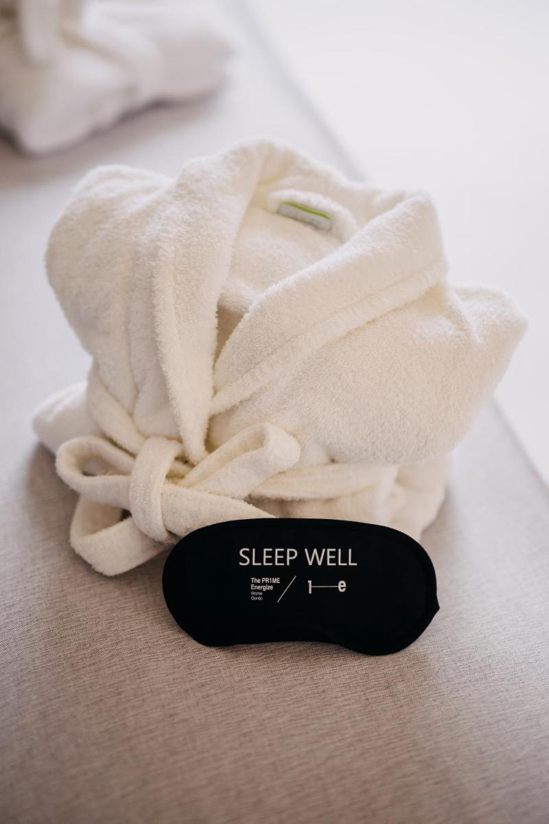 Uma cama ou camas num quarto em The Prime Energize Hotel & SPA - Algarve