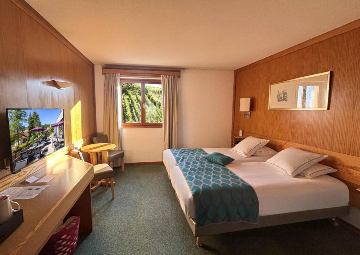 Un ou plusieurs lits dans un hébergement de l'établissement Best Western Plus Hotel & SPA Le Schoenenbourg