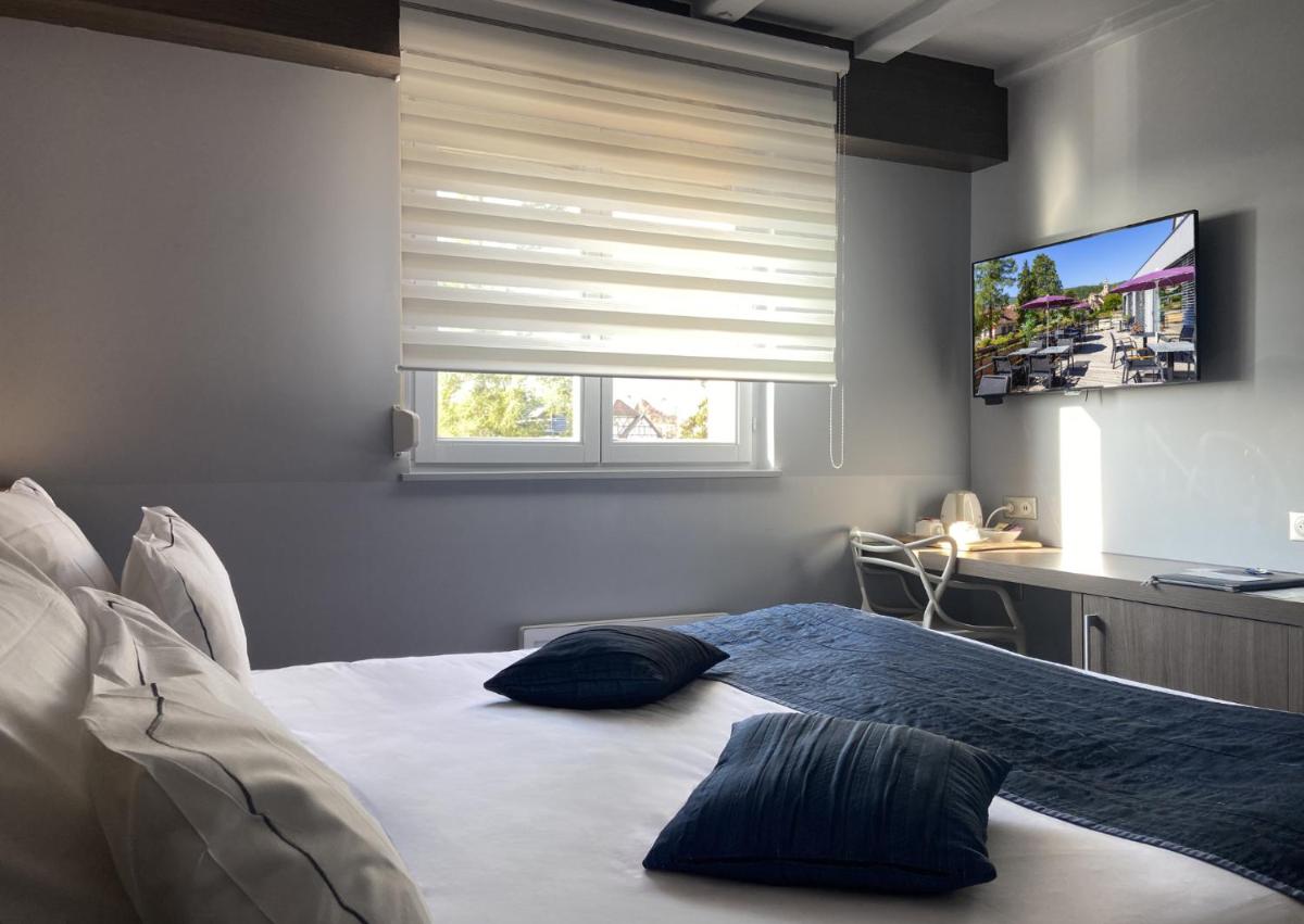 Un ou plusieurs lits dans un hébergement de l'établissement Best Western Plus Hotel & SPA Le Schoenenbourg