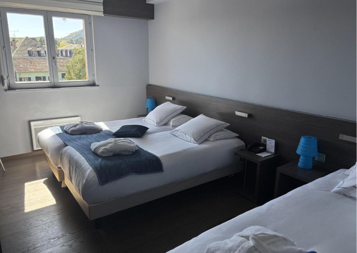 Un ou plusieurs lits dans un hébergement de l'établissement Best Western Plus Hotel & SPA Le Schoenenbourg