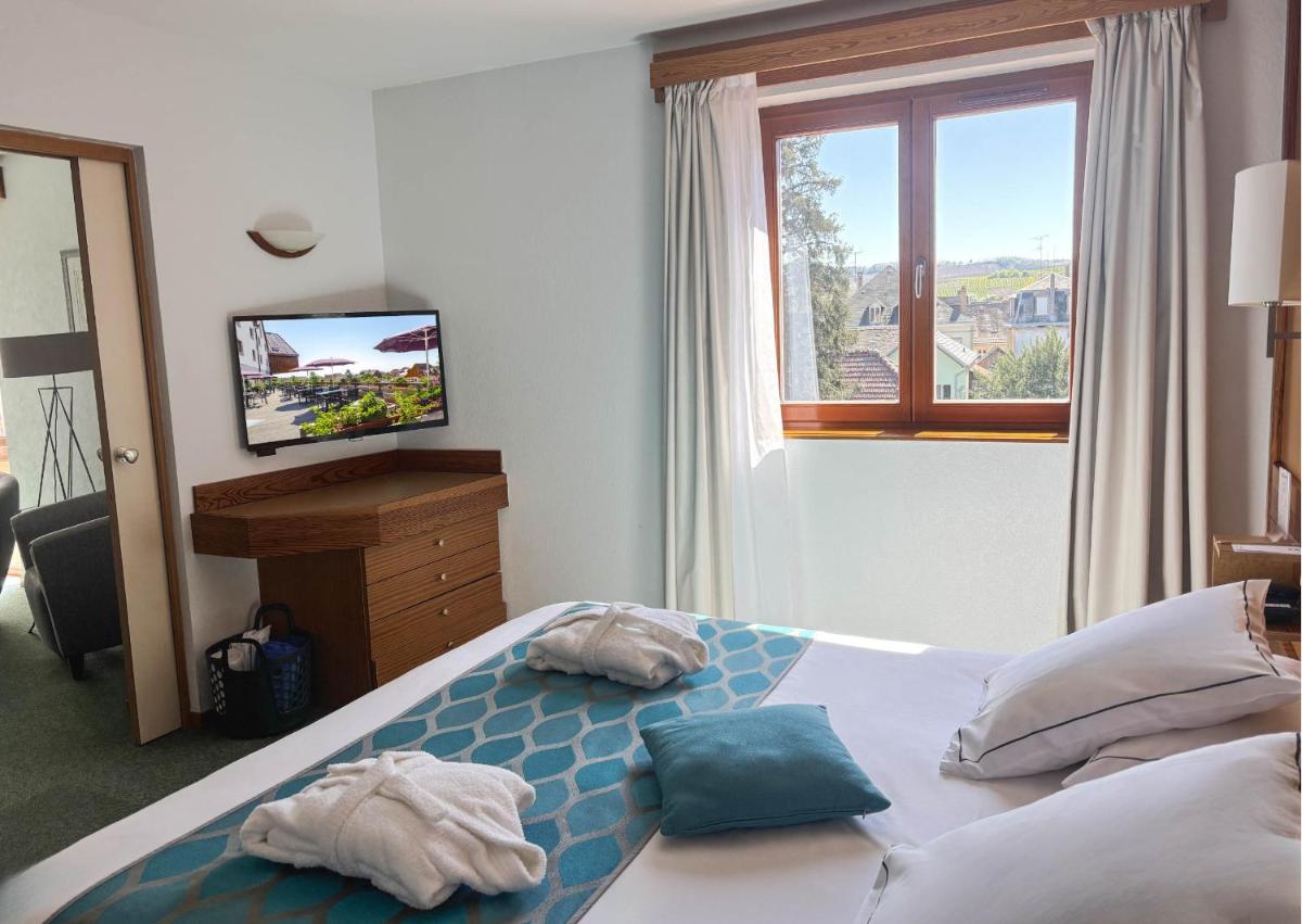 Un ou plusieurs lits dans un hébergement de l'établissement Best Western Plus Hotel & SPA Le Schoenenbourg