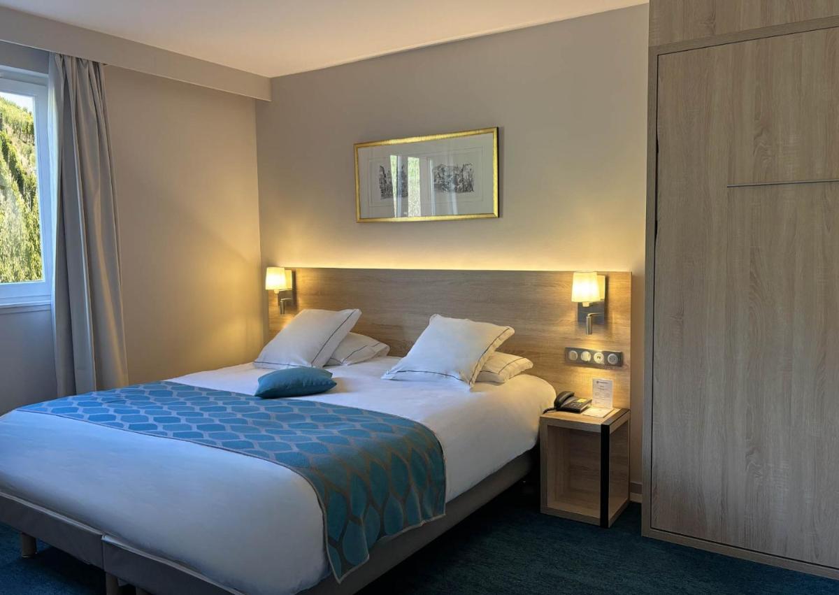 Un ou plusieurs lits dans un hébergement de l'établissement Best Western Plus Hotel & SPA Le Schoenenbourg