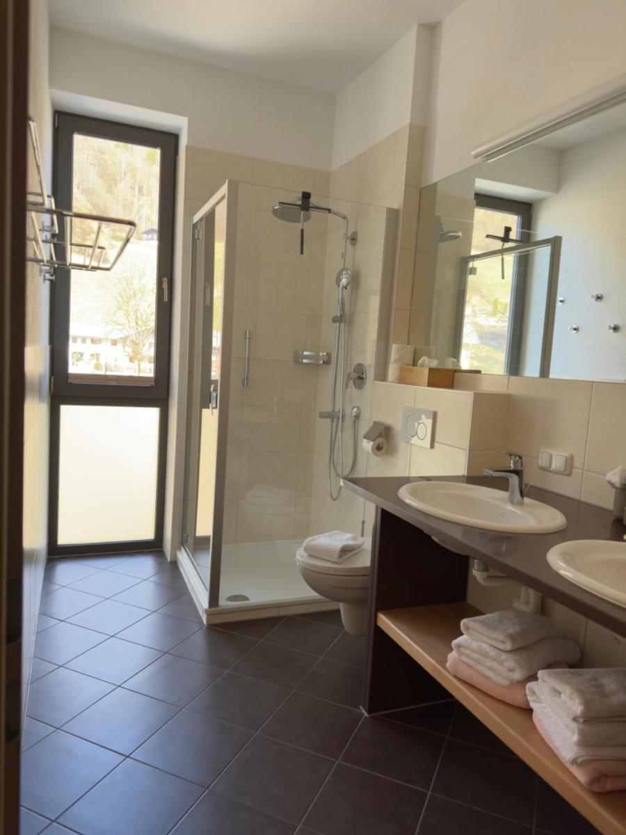 Ein Badezimmer in der Unterkunft Alpenglühn Apartments - Adult Only