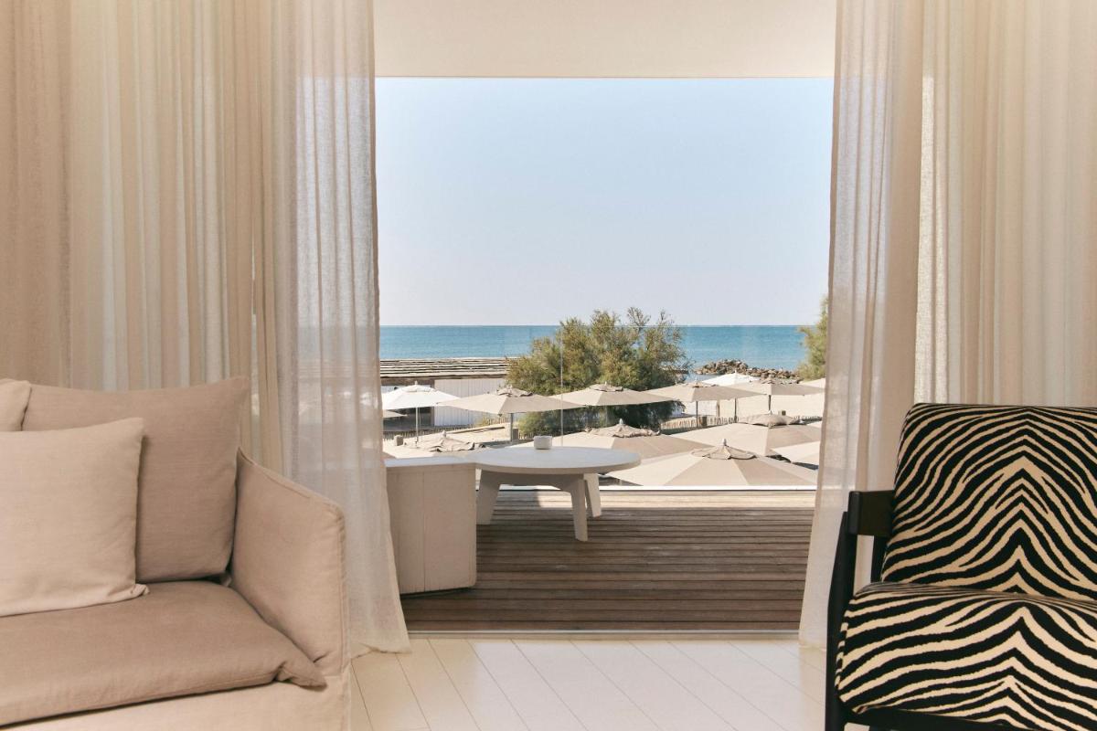 Coin salon dans l'établissement Hôtel Plage Palace & Spa