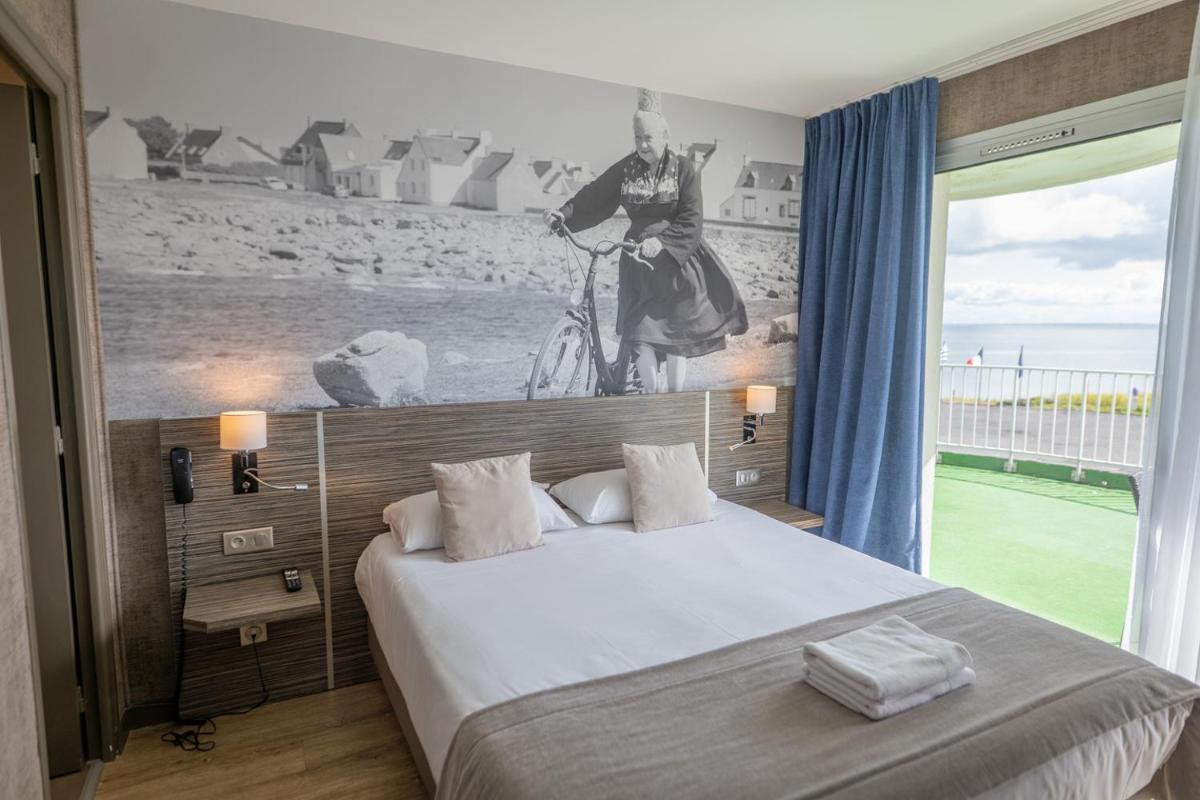 Un ou plusieurs lits dans un hébergement de l'établissement Hotel Europa