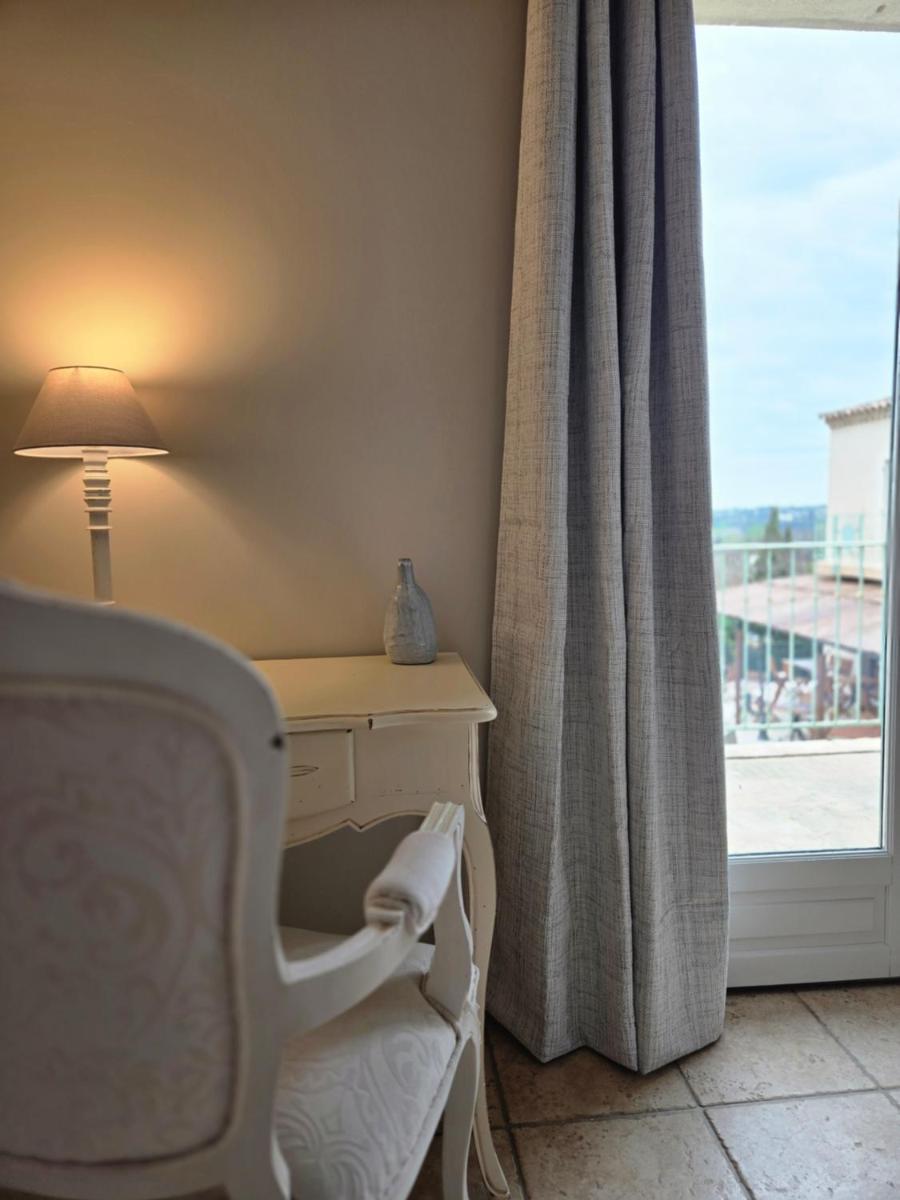 Un ou plusieurs lits dans un hébergement de l'établissement CÉRÈS - Boutique-Hôtel & Spa