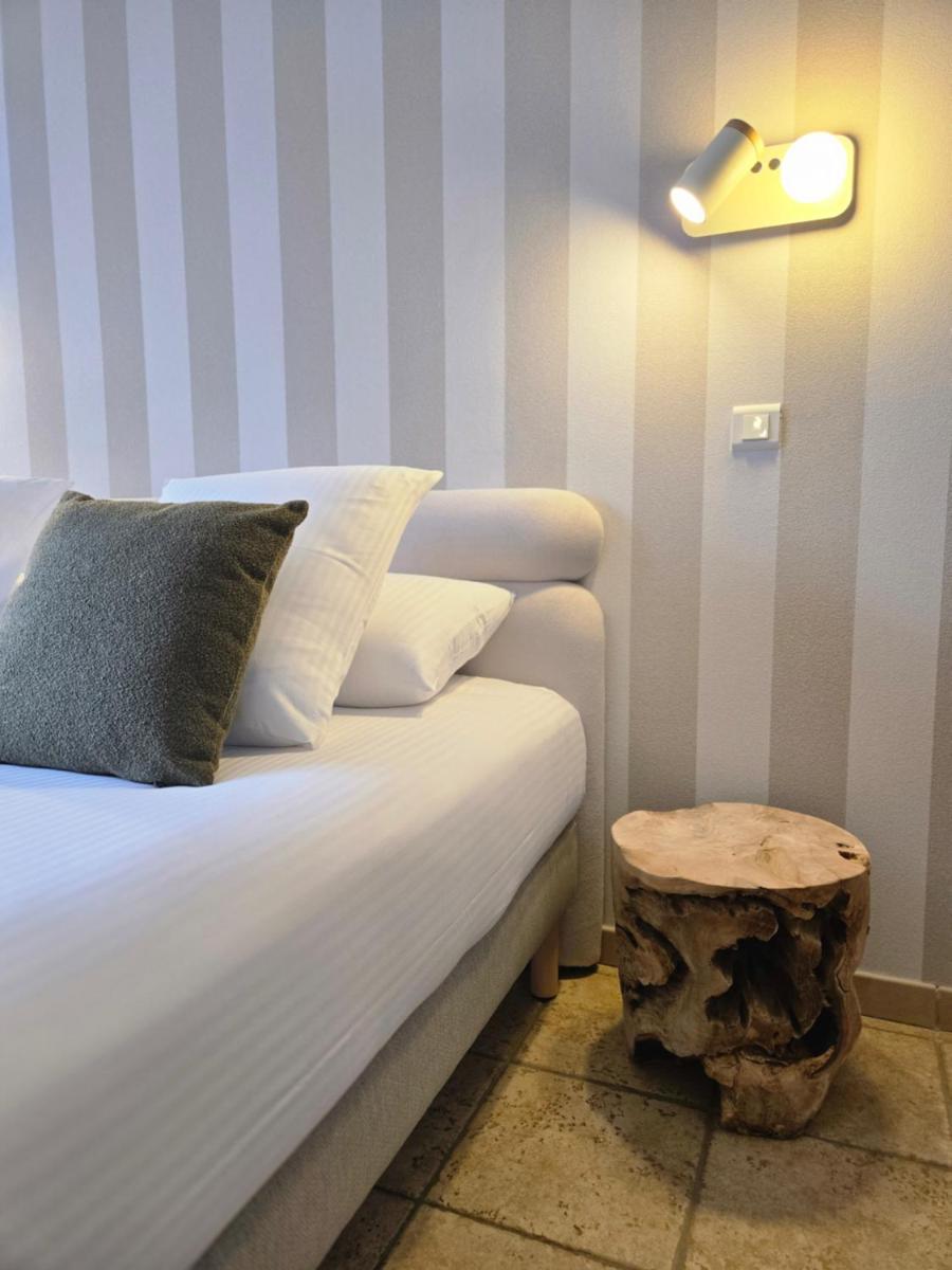 Coin salon dans l'établissement CÉRÈS - Boutique-Hôtel & Spa
